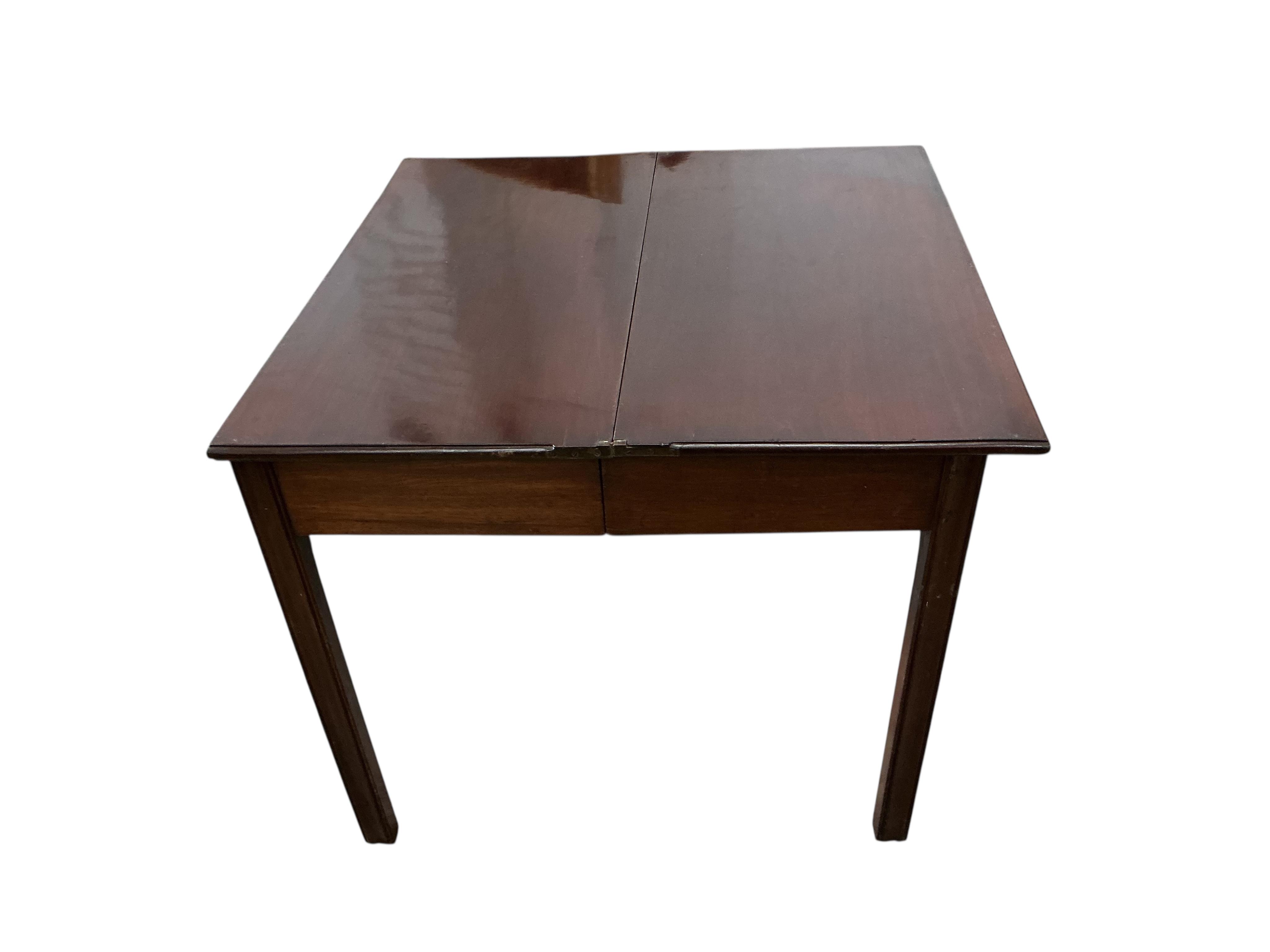 A George III mahogany rectangular folding tea table, width 83cm, depth 41cm, height 72cm